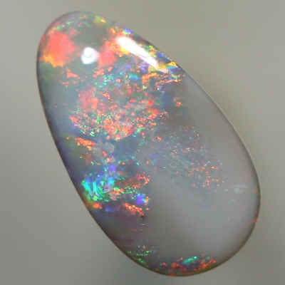 SOLID SEMI BLACK OPAL Bright red fire contrasts with green
